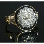 A Georgian diamond and enamel memorial ring, c.1790,a cushion cut diamond, grain set to the