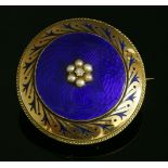 A Victorian diamond, split pearl and enamel, circular shield form brooch, c.1850,with a circular