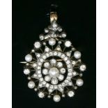 A Victorian pearl and diamond oval brooch/pendant, c.1880,with a 5 to 5.5mm pearl, peg set to the