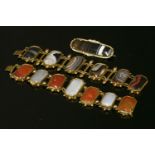 A gilt metal agate panel bracelet, c.1830, with a series of rectangular cut corner agate tablets,