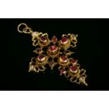 An Iberian gold, ruby and diamond set cross,with graduated foiled rubies rub set to plain collets,