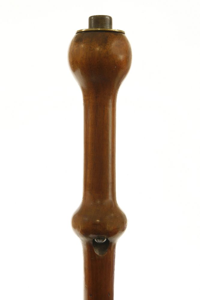 A gentleman's cane, having an in-built battery and lamp on the stem, believed to have been