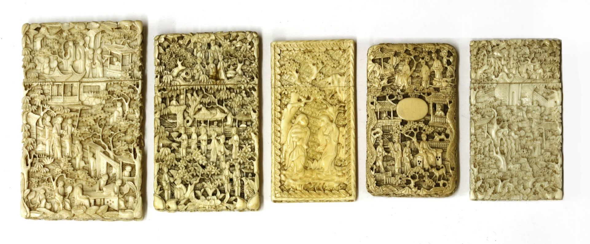 Five ivory cases,with figures in landscapes, buildings, trees and flowers,largest 10.75 x 6.5cm (5) - Image 2 of 2