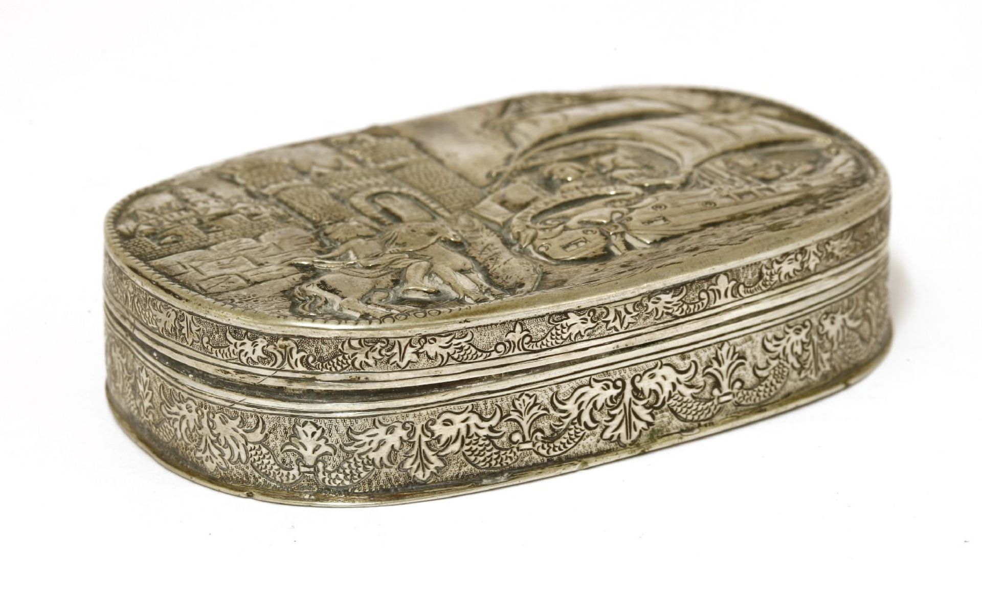 A silver box, of rounded rectangular form, the hinged lid embossed with a galleon named 'ALION H