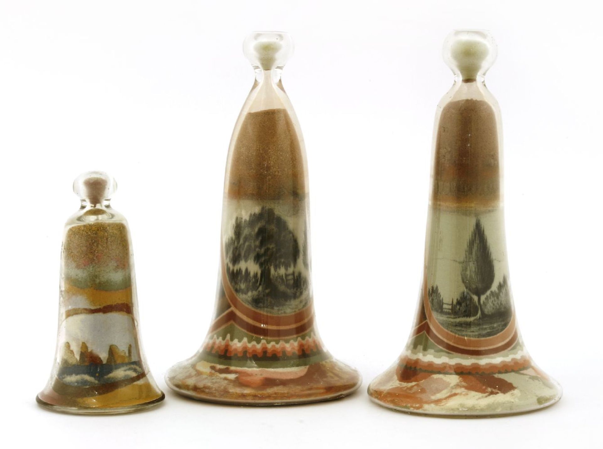 A pair of Alum Bay sand ornaments by W Carpenter,each in bell-shaped glass vessels, one with a - Image 2 of 2