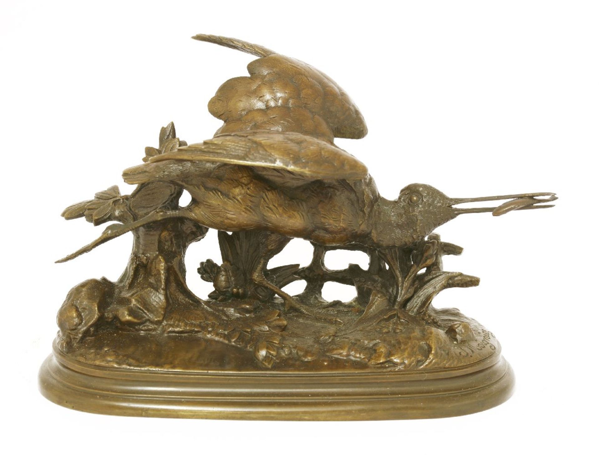 After Jules Moigniez,a bronze of a water bird catching a fish, on a naturalistically raised base,