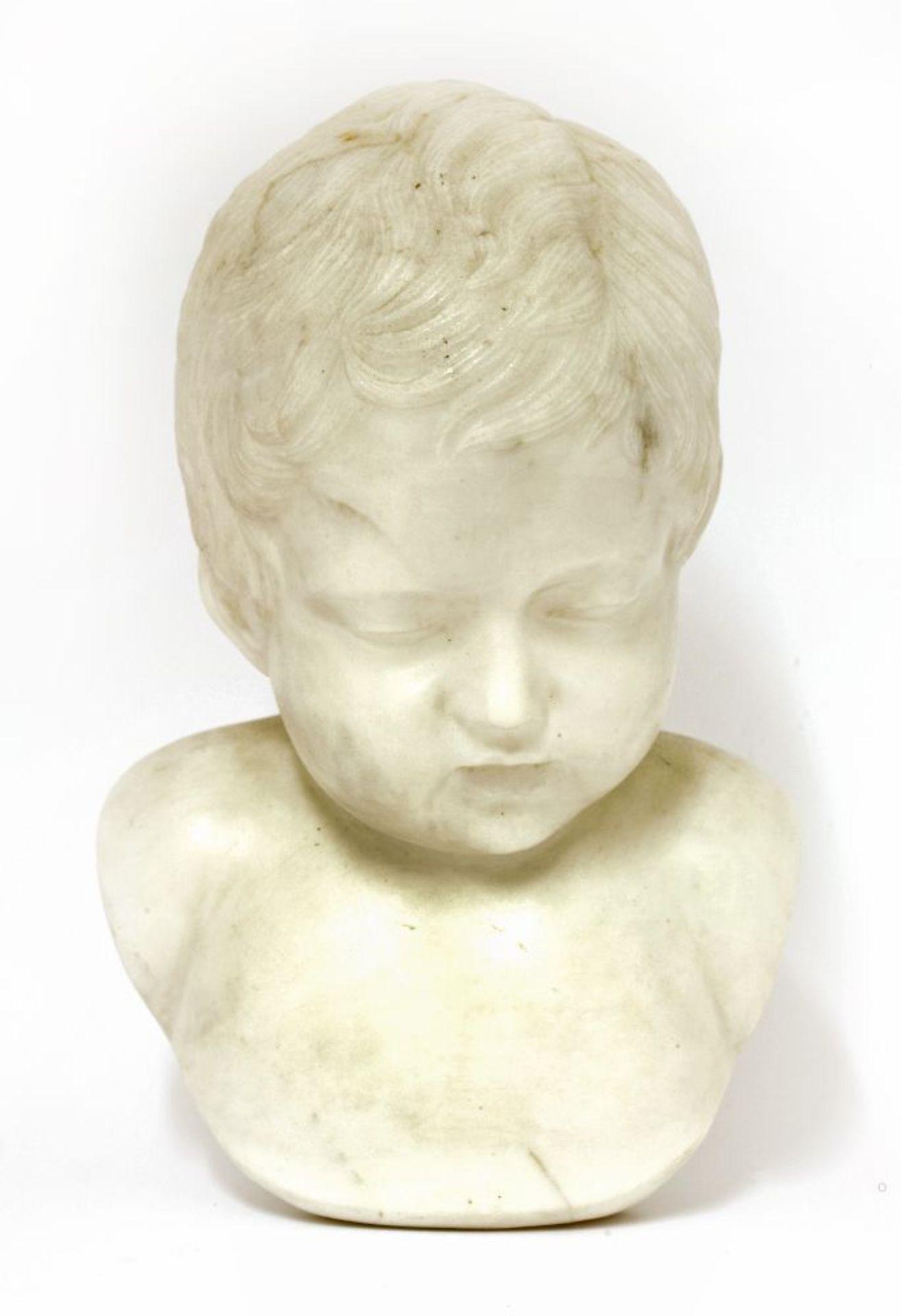 François Duquesnoy, called 'Il Fiammingo',a marble bust of a child, signed verso, 30cm