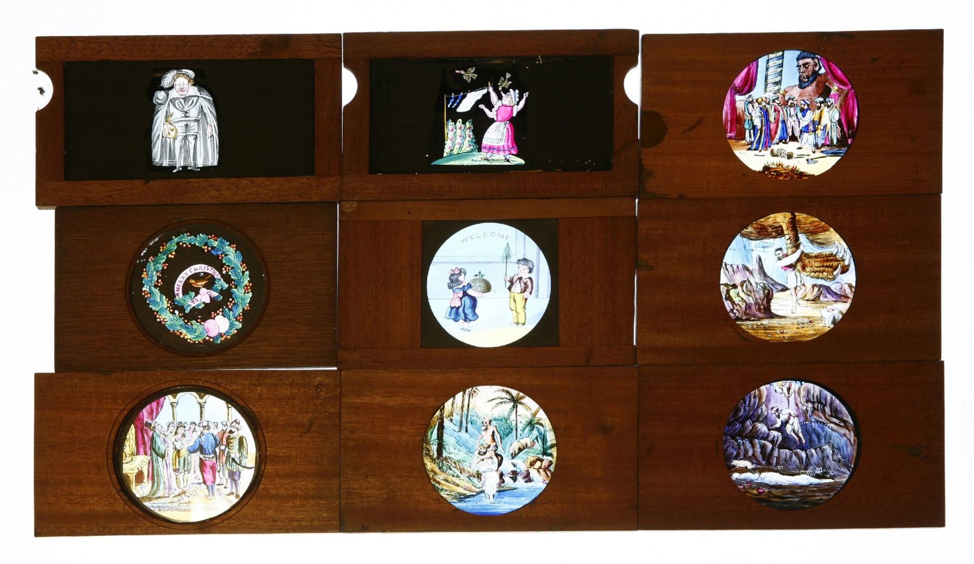 Wooden framed magic lantern slides,comprising: 26 coloured comic sliders,18 x 10cm,6 processional,