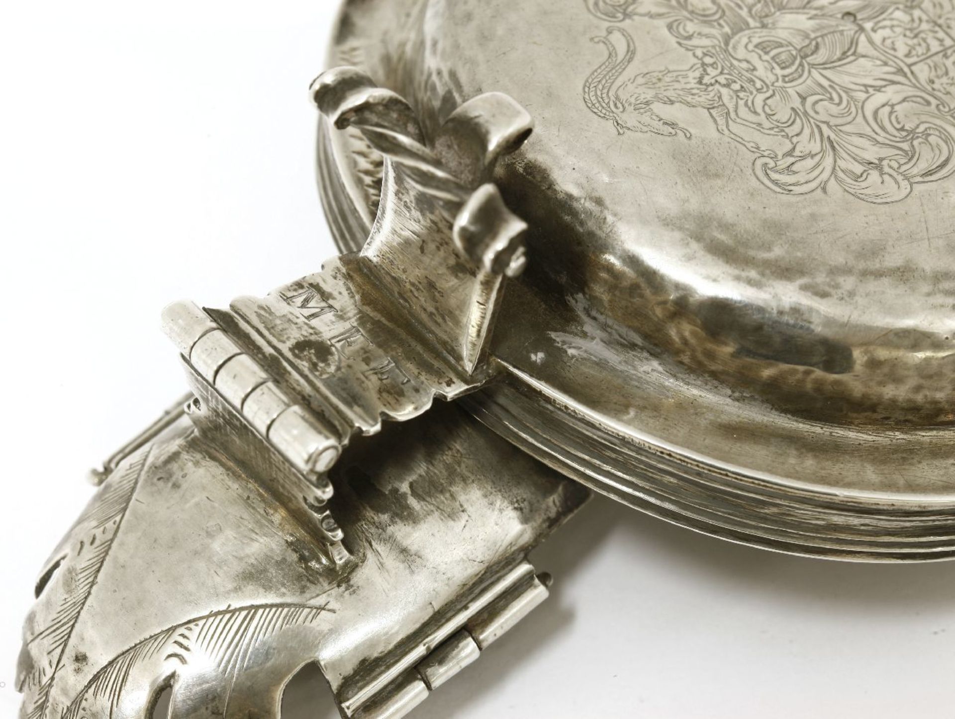 A Dutch silver tankard mount,engraved with an armorial and dated '1683', initialled M E F below - Image 2 of 3