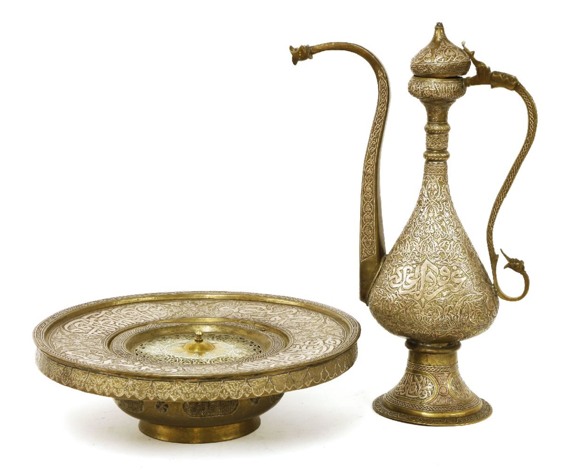 A Cairoware ewer and basin,20th century, the slender ewer raised on a flared foot, with calligraphic