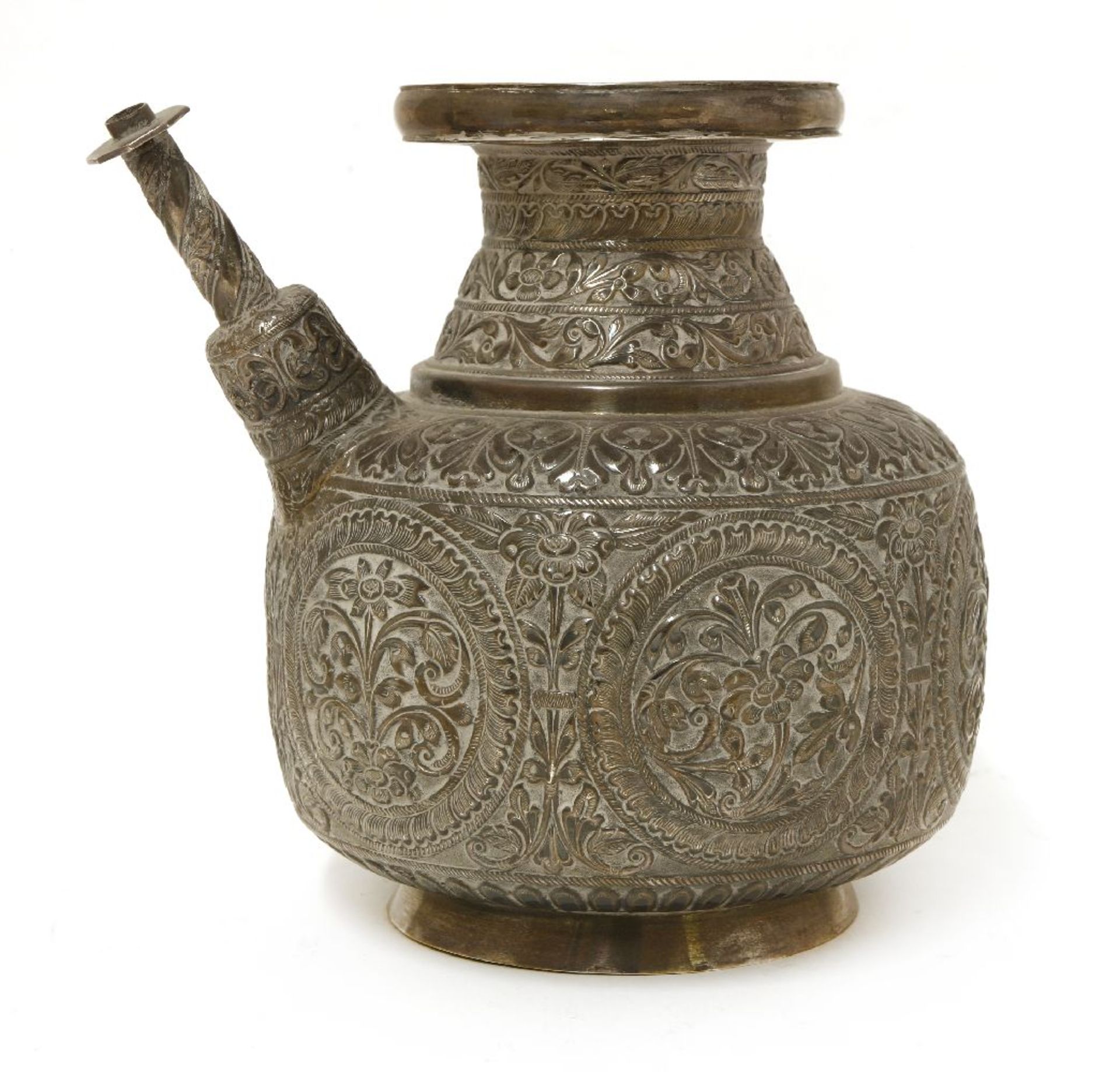An Indian silver water carrier, unmarked,embossed with scrollwork and roundels centred with flowers,
