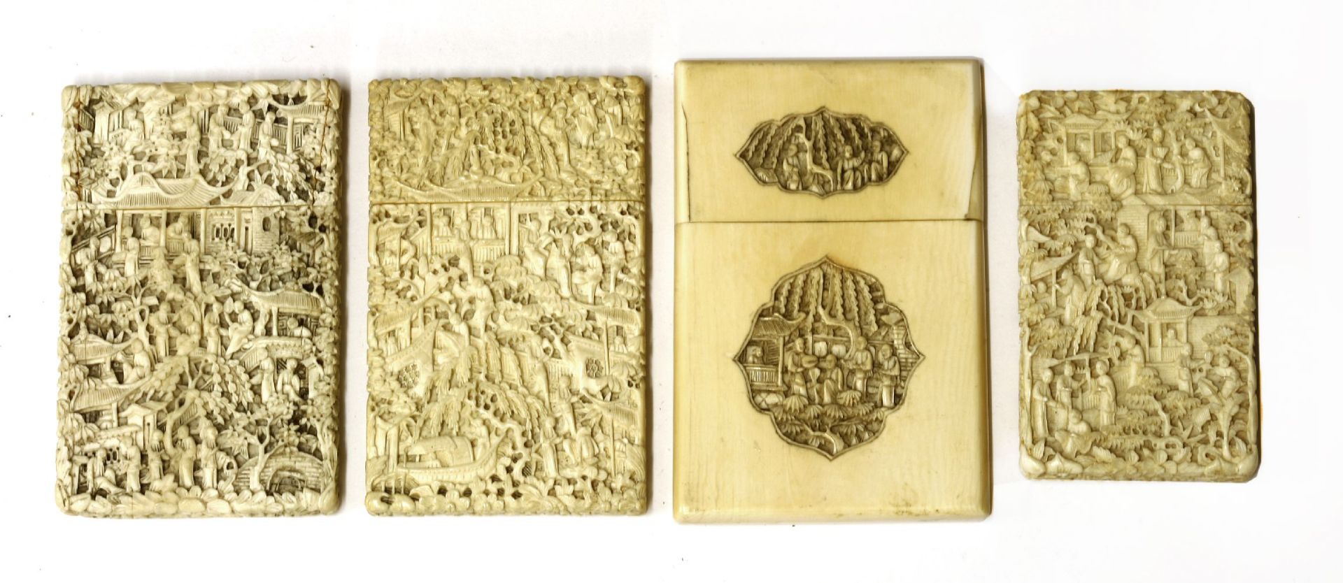 Four ivory cases,carved with figures in landscapes, pagodas, trees and foliage,largest 11.5 x 7. - Image 2 of 2