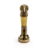A Victorian silver-mounted ivory seal,maker's mark 'W F'(?), London, 1878,in the form of an owl with