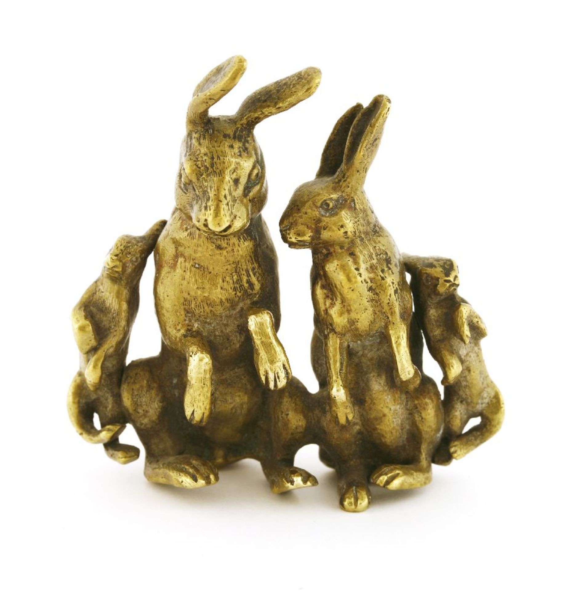 An animalier bronze group depicting a family of rabbits,late 19th century, each seated on their