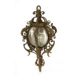 A wrought glazed hall lantern, with bevelled glass panels,66cm drop excluding chain