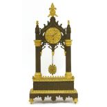 A Charles X gilt and patinated bronze 'Troubador' temple timepiece,with well-cast Gothic decoration,