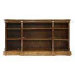 A Victorian burr walnut breakfront open bookcase,with gilt bronze mounts and jasperware panels, with