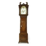 A George III inlaid mahogany eight-day longcase clock,the painted arch dial having ship and exotic