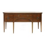 A George III mahogany and inlaid sideboard,with a shaped breakfront with drawers and cupboards,184cm