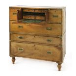 A teak secretaire campaign chest,in two parts, with a central secretaire drawer and