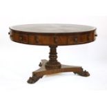 A William IV mahogany drum table,the circular inset top with green leather over a ribbed border