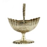 An Irish silver basket,maker's mark RS, Dublin, 1802,of stamped oval form, with a swing handle,