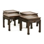 A set of four Chinese padouk occasional tables,20th century, each with pierced and carved