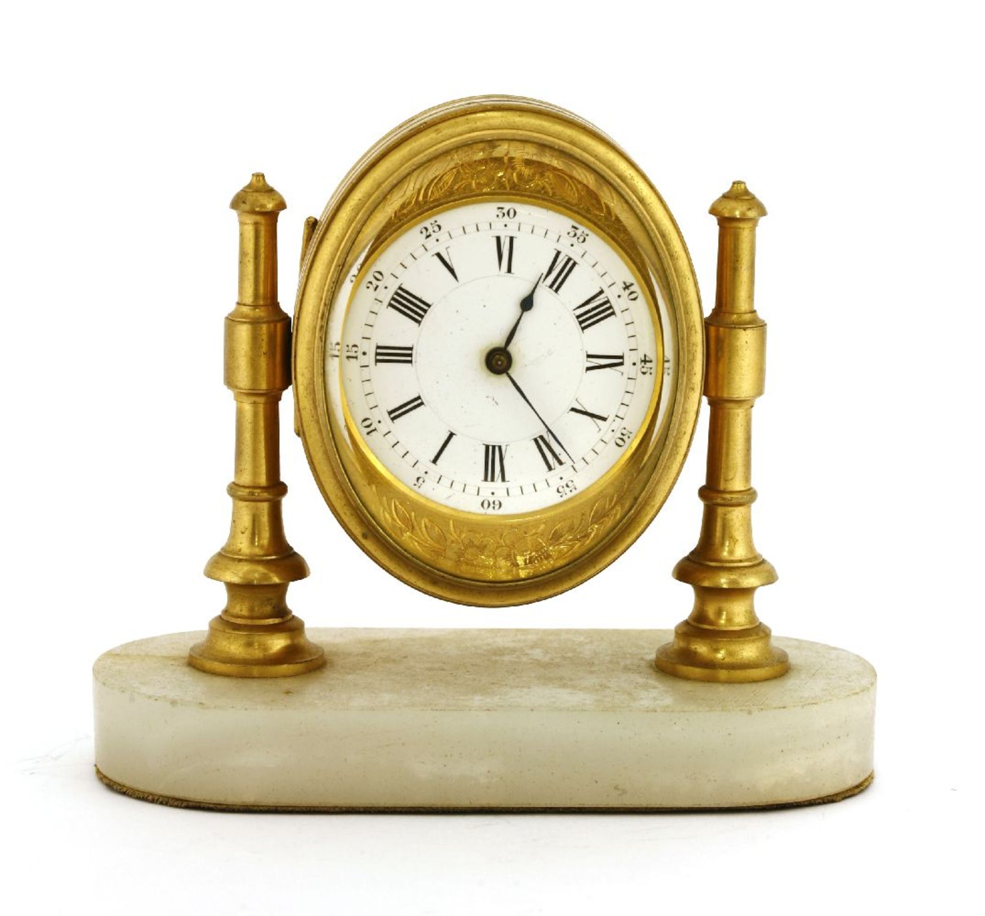 A French gilt bronze mantel timepiece,late 19th century, the oval case housing a circular enamel