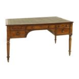 A Victorian mahogany partners' desk,the leather inset top over five drawers to each side and