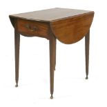 A George III solid mahogany Pembroke table,the oval drop-leaf top over a single frieze drawer,