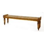 A Victorian light oak bench seat, on turned and faceted legs,184cm wide38cm deep50cm high