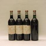 Château Pape Clément, Cru Classé des Graves, 1982, four bottles (all low neck, two very damaged