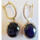 A pair of 18-carat white gold, large sapphire and diamond Earrings,