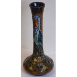 A modern Moorcroft pottery Bottle Vase, tube lined and decorated with a Peacock,