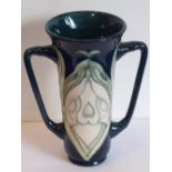 A modern two-handled Moorcroft pottery Vase (in earlier Florian ware style),