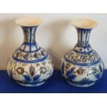 A matched pair of antique Persian pottery Bottle Vases,