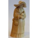 A Royal Worcester porcelain Candle Snuffer in ivory and gilt: The Abbess,