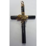 A 19th century yellow metal mounted and black metal Crucifix,