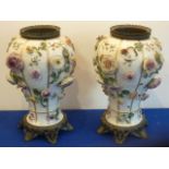 A pair of late-19th/early-20th century Continental porcelain and metal mounted baluster-shaped