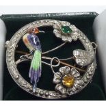 A round sterling silver and enamel Brooch,