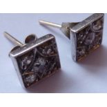 A pair of ladies white metal Stud Earrings,