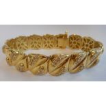 An 18-carat gold Bracelet consisting of 14 links, each set with 20 diamonds, approx.