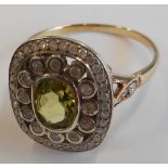 A 15-carat gold ladies peridot and diamond Cluster Ring