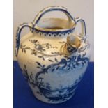 A late-19th/early-20th century Delftware pottery two-handled baluster-shaped Vessel with spout and