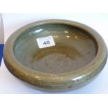 A Chinese Yuan/Longquan green glaze Bowl the interior with incised characters representing