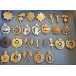 Twenty-seven cap and other military badges consisting of thirteen Support Arms,