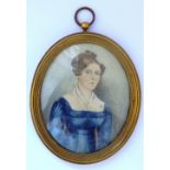 A 19th century gilt-metal framed and glazed watercolour, half-length oval female portrait study,