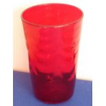 A Whitefriars ruby red tapering circular glass Vase having a rippled effect to the glass (perfect