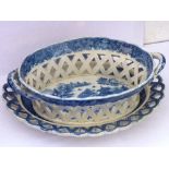 An early 19th century English pearlware two-handled Chestnut Basket and Stand of oval form and