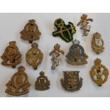 Ten Support Services cap badges: the Army Ordnance Corps,